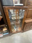 A glazed display cabinet, 60cm wide x 28cm deep x 115cm high. COLLECT ONLY.