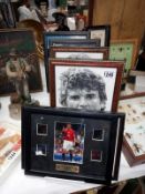 A collection of framed footballer pictures