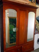 A double mirrored inlaid wardrobe