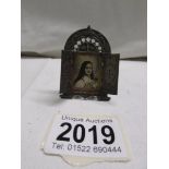 A 19/20 century miniature French white metal Tryptich icon. 5.5 x 4 cm.