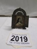 A 19/20 century miniature French white metal Tryptich icon. 5.5 x 4 cm.