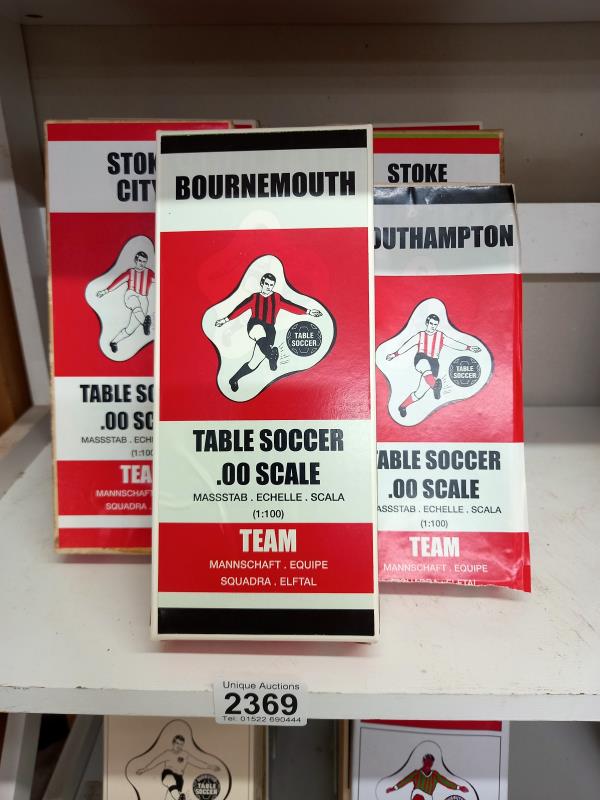 9 boxed table soccer teams (Subbuteo) including Liverpool, Stoke, Wrexham etc