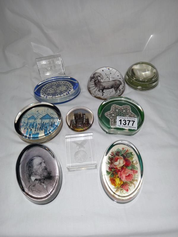 A collection of 10 paperweights