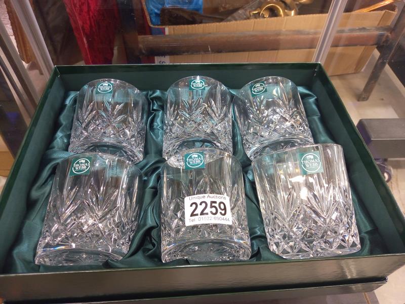 Two boxed sets of Edinburgh Crystal whisky tumblers.