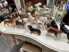 A quantity of dog figurines