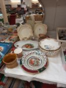 A quantity of interesting china including jugs, bowls & plates