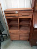 A teak shelf unit with drawers. 60cm x 26cm x 106cm high COLLECT ONLY