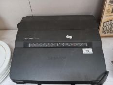 A Sharp electric typewriter (model PA-3100) untested COLLECT ONLY