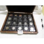 A cased collection of uncirculates/proof Elizabeth II commonwealth coins.