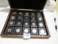 A cased collection of uncirculates/proof Elizabeth II commonwealth coins.