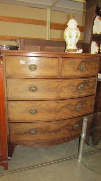 A Victorian mahogany inlaid two over three chest of drawers with brass handles. COLLECT ONLY