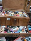 An early sewing box with drawer full of cottons etc.