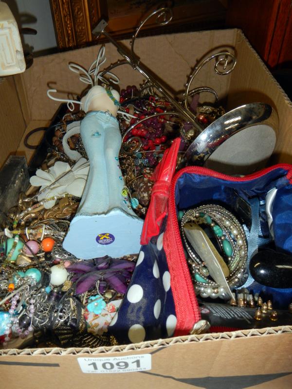 A box of costume jewellery stands etc.