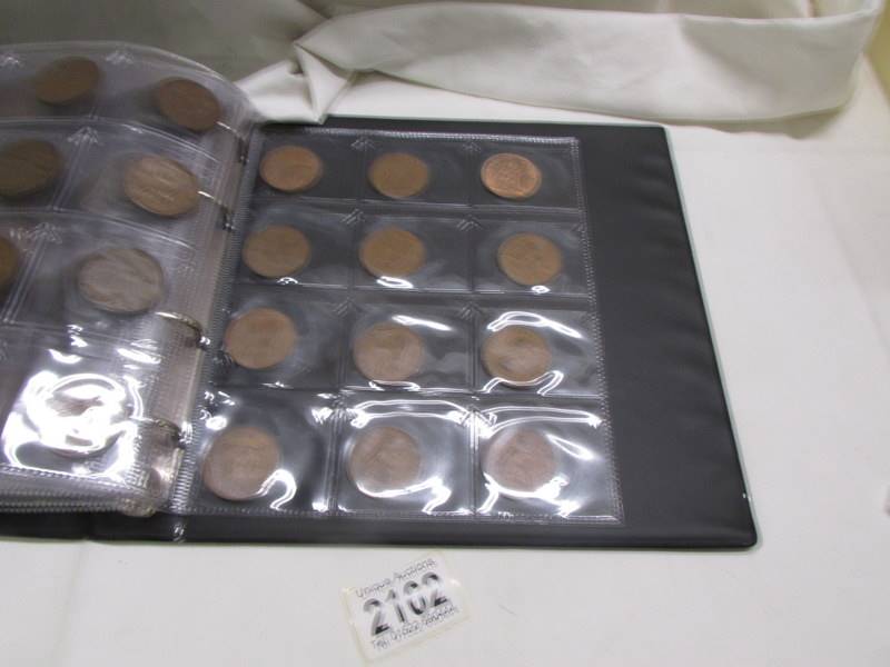 An album of in excess of 300 world coins. - Image 16 of 16