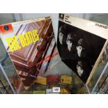 Two Beatles LP records including, Please Please Me