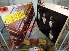 Two Beatles LP records including, Please Please Me