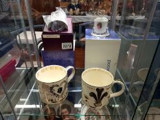 Two boxed Wedgwood mugs - 1969 Prince of Wales and 1977 Jubilee, a Royal Albert mug and a Charles