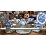 A selection of old & new blue & white porcelain including meat platters, plates, bowls, jugs &