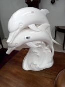 A large white glazed figure of a Dolphin pair (Height 51cm) A/F crack to base COLLECT ONLY