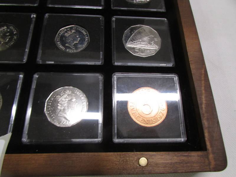 A cased collection of uncirculates/proof Elizabeth II commonwealth coins. - Image 5 of 5