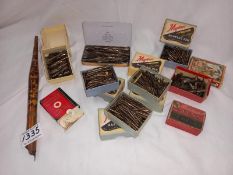 A collection of old pen nibs in collector boxes