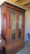 An early 20th century mahogany two door wardrobe with drawer base. COLLECT ONLY.