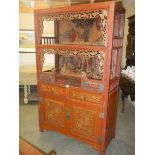 An old Chinese carved cabinet with painted back panels. COLLECT ONLY.