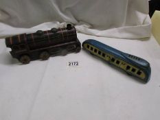 A rare Wells Brimtoy tin plate clockwork 'Golden Streak' streamline train and a Japanese tinplate