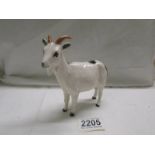 A Royal Doulton goat, in good condition.