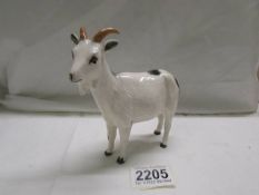 A Royal Doulton goat, in good condition.