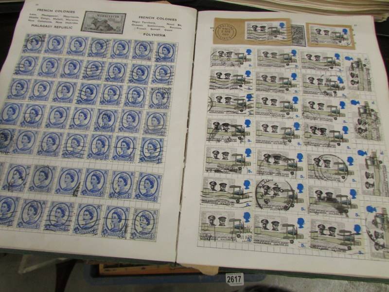 A collection of UK stamps in five albums/folders. - Image 12 of 14