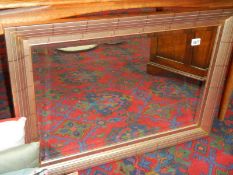 A gilt framed bevel edged mirror in good condition, collect only.