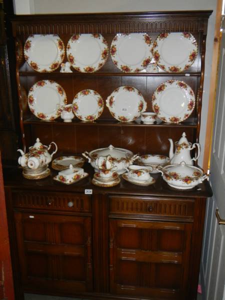 An oak 2 door/2 drawer open rack dresser. COLLECT ONLY.