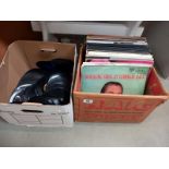 A box of classical LP's and a box of unsleeved 45's