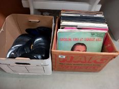 A box of classical LP's and a box of unsleeved 45's