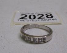 An 18ct gold diamond set eternity ring.