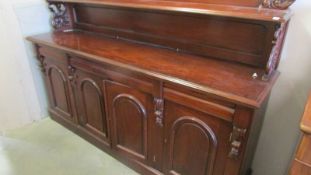 A good Victorian style mahogany 4 door, 4 drawer sideboard. COLLECT ONLY.