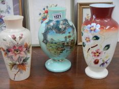 Three early 20th century hand painted glass vases.