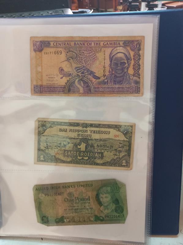 An album of approximately 86 world bank notes. - Image 19 of 26