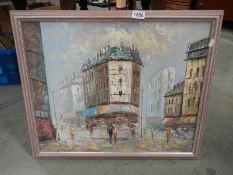 A 20th century French street scene oil on canvas painting.