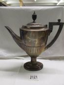 A silver coffee pot, approximately 398 grams with handle.