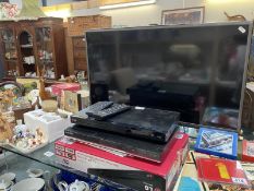 A TV and 2 DVD players