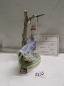 A Royal Worcester limited edition figurine, 'Alice', 12/500.
