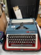 A retro Erika typewriter with case