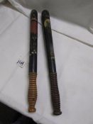 Two painted Victorian truncheons, (some paint loss on both).