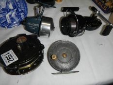 Four old fishing reels including The Mentor, Norris, Mitchell etc.,