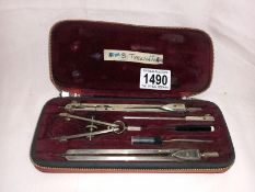 A cased compass set