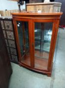 A modern cabinet with engraved glass door. COLLECT ONLY.