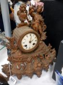An old early French gilded mantle clock