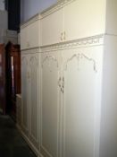 A large 4 door wardrobe in good order & a 5 drawer chest